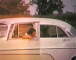 8mm_01_078 girl in car - Nola
